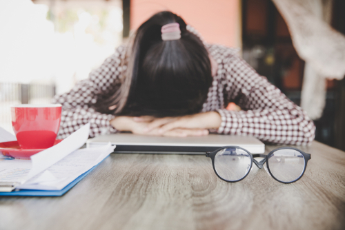 Stressed frustrated young woman employee feeling pain unwell dizzy