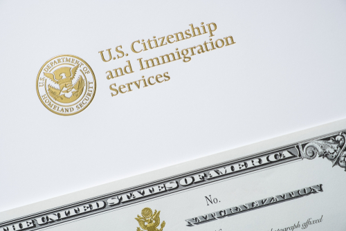 Citizenship and Immigration Services with certificate of naturalizationU.S