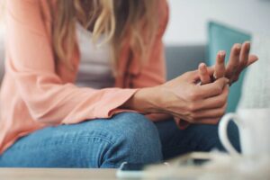 Hands, woman and ring with doubt in marriage for toxic relationship