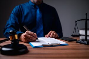 The immigration officer brought down the gavel of justice on the table
